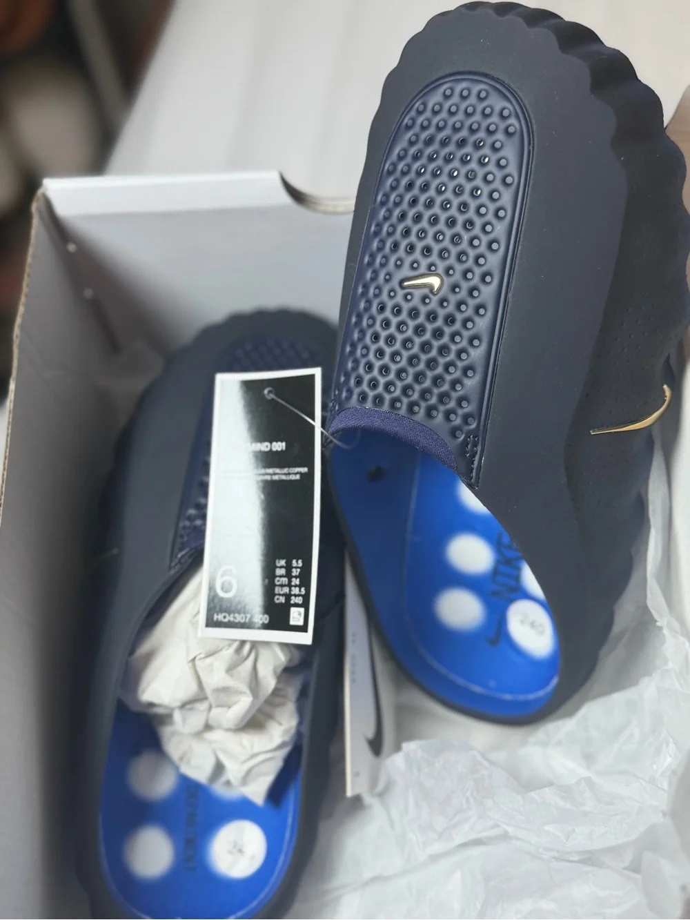 Nike Men's Navy and Blue Slide Sandals with Gold Swoosh